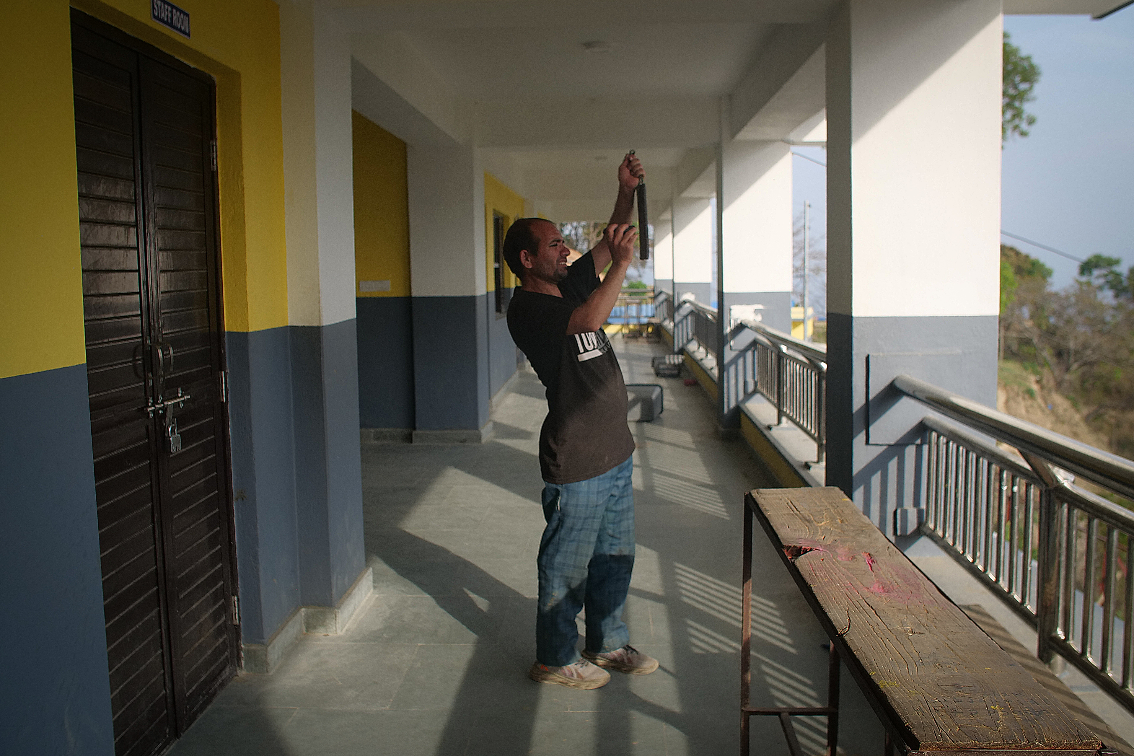 Gyaneshwori sec school mah karyalaya sahayogi ko kaam gardai, ghanti lagaudai madiram, uni 10-4 yahi school ko karmachri mah kaam gardai, yahi school mah 8-10 study gare..JPG